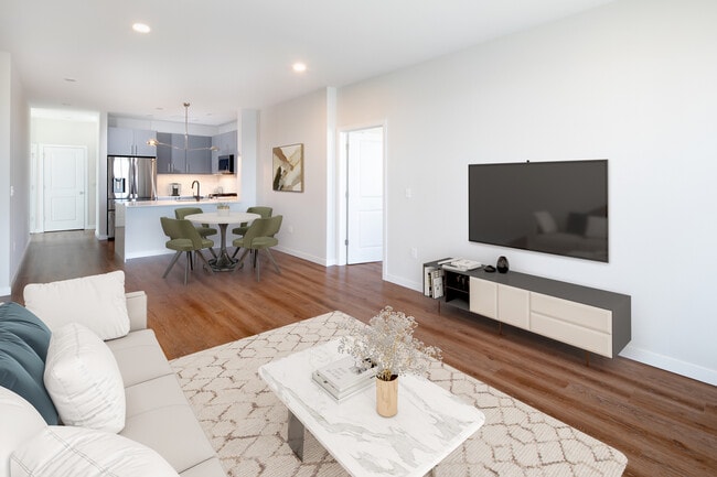 Signature Collection living room, dining area, and kitchen