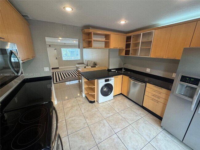 Photo - 677 NE 24th St Unit 203