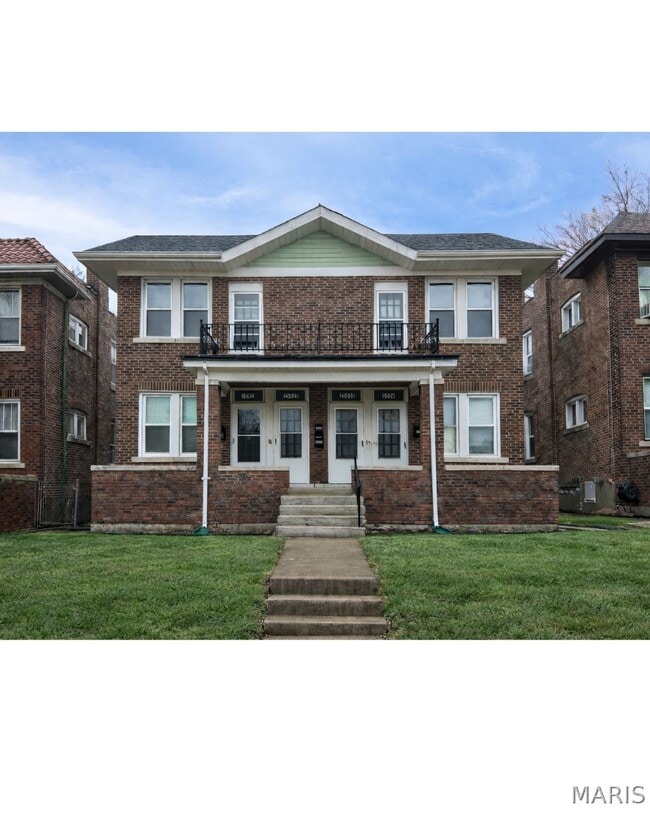 Building Photo - 5042 Pernod Ave Unit 1F