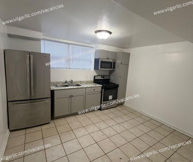 Photo - 700 E 20th Ave Unidad Basement