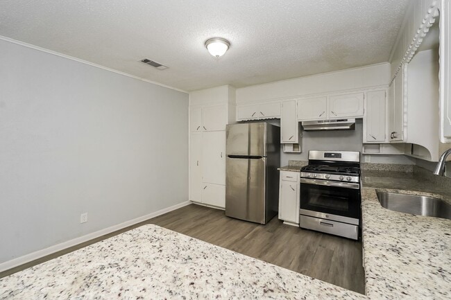 Photo - Newly Renovated Single Family Home | 4 BR/2BA | Car Covered Parking | With 2 living areas