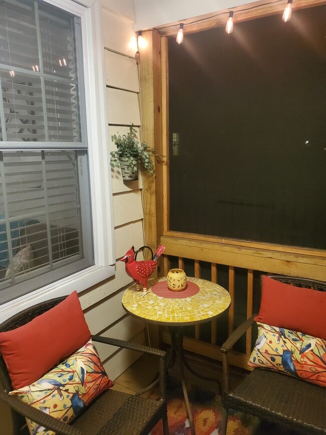 Screened in porch with fan - 1018 W 45th St Unit #2