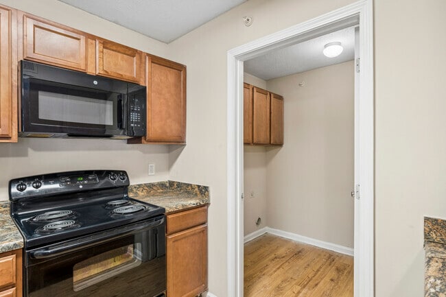 3BR, 2BA - 1,240SF - Kitchen with Adjacent Laundry Room - Briar Grove Apartment Homes