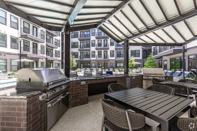 Pool with Outdoor Grilling & Dining Space