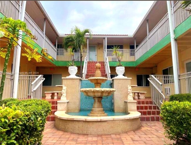 Building Photo - 7400 Harding Ave Unit