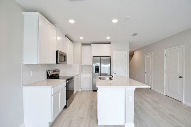 Photo - Brand-New 3/3 Modern Townhome in Gated Tys...