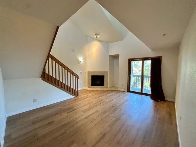 Photo - Stylish 3rd Level, Private 2 bedroom Apartment With LVP Flooring, Decks, Gas Fireplace & In-Unit ... Unit 302