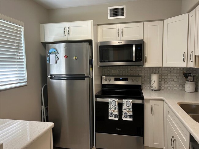 Photo - 5662 Gardens Dr Unit 104