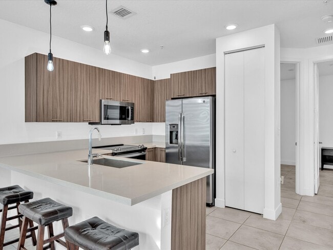 Photo - 6410 NW 102nd Path Unidad 6410-302