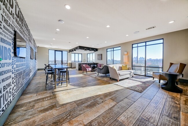 Our rooftop lounge features ample seating and a fire pit.