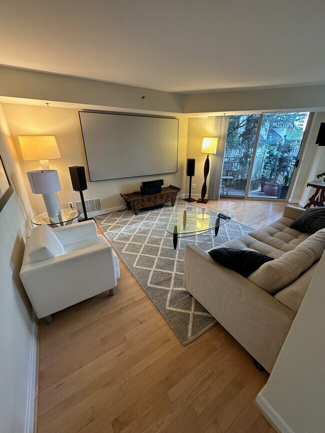 living room - 7500 Woodmont Ave Unit 407
