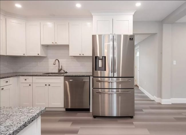 Photo - 3 Bed Home with a Yard and Garage! Available for July!