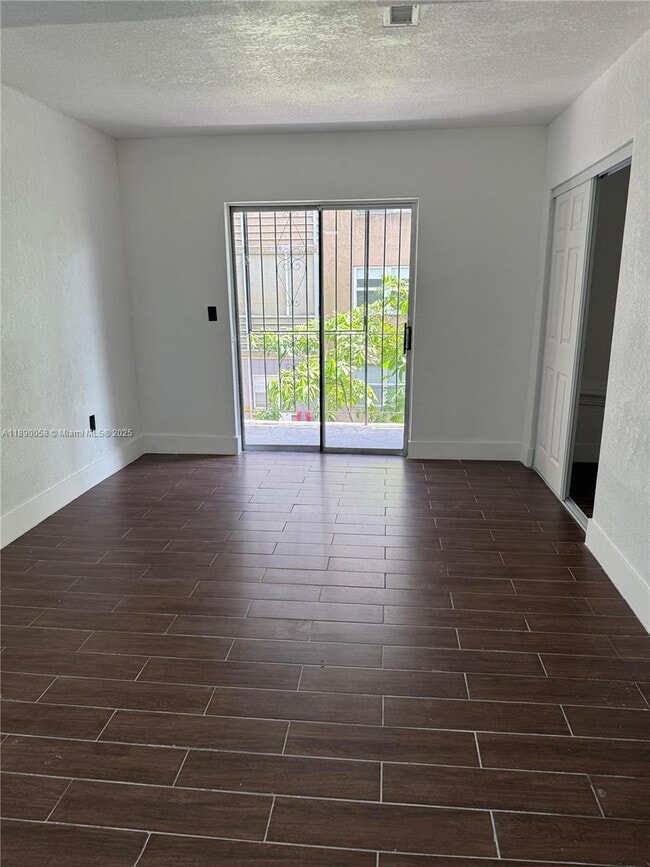 Building Photo - 6625 W 4th Ave Unit 204