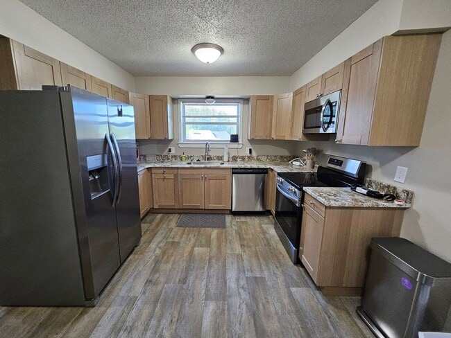 Photo - Pet friendly split-level 3 bedroom, 1 bathroom bi-attached home!