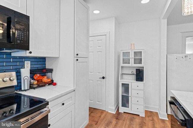 Photo - Welcome to this sunny and updated 4-bedroom, 2-bath row home in the heart of Mt. Airy! W/D! Large...
