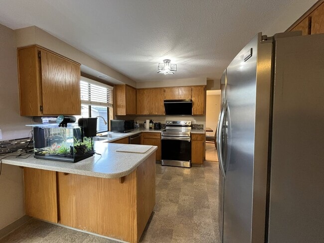 Photo - Light-Filled Three Bedroom Home with Private Bonus Space and Outdoor Living