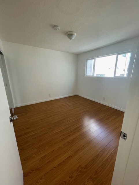 2nd Bedroom with one large window - 5462 Barton Ave Unit 6