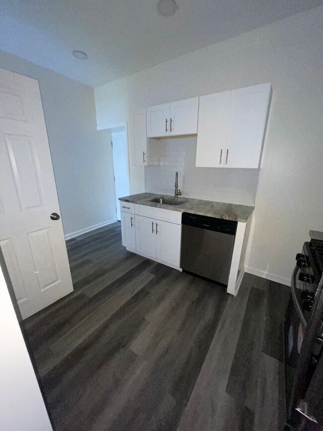 Photo - 3-Bedroom Home with Modern Finishes & Spacious Backyard
