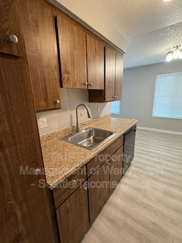 Building Photo - 8626 26th Ave SW Unit #A