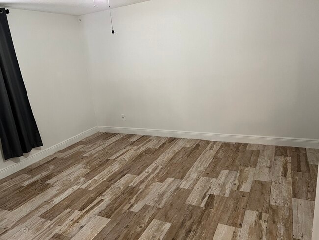 1st bedroom with tile floor