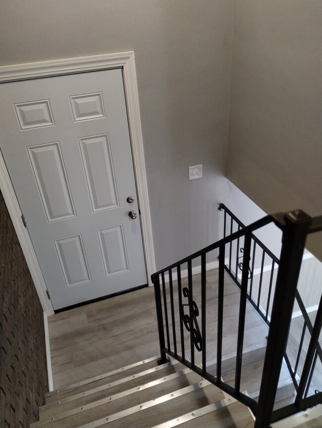 View from landing to the foyer - 218 Castellano Dr Townhome
