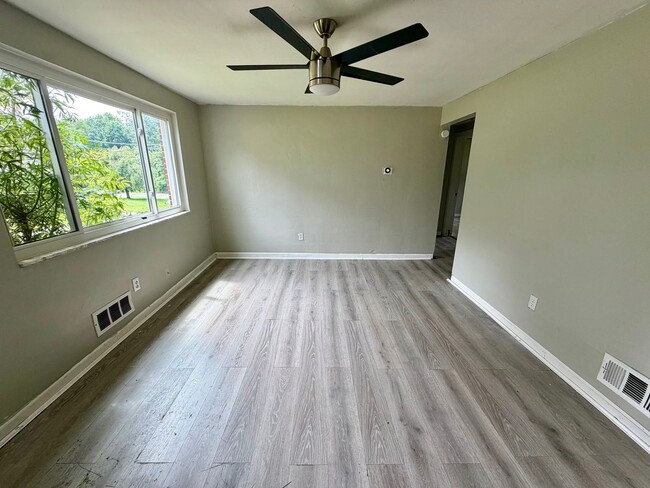 Photo - Comfortable 3-Bedroom Ranch with Yard, Garage & Bonus Basement Space