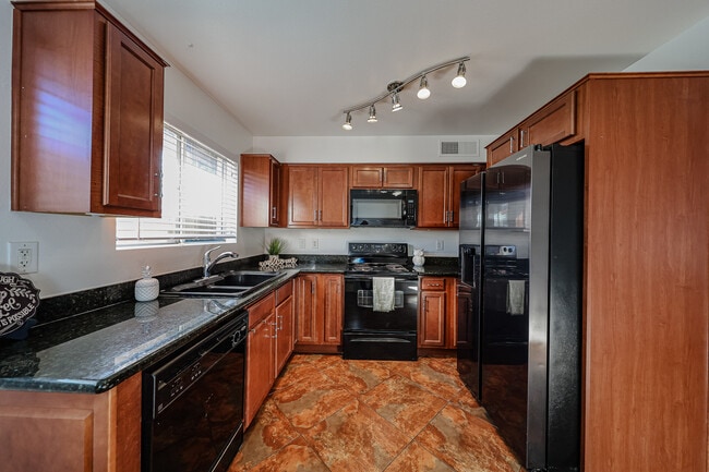 Nicely updated kitchen with brand new black stainless fridge & ice maker - 3022 N 37th St Unit 4