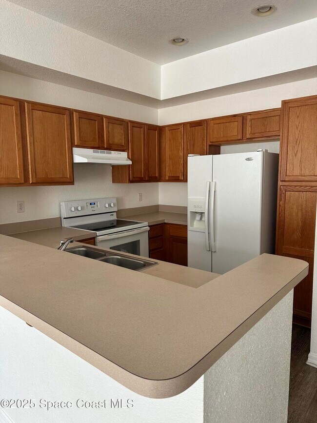 Photo - 105 Turpial Way Unit 104