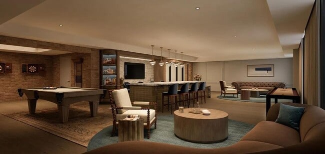 Speakeasy Lounge with billiards, lounge seating, and rich wood and brick accents, creating an intimate setting for conversation and social gatherings.