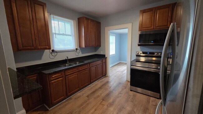 Photo - Affordable 3 Bed in Jacksonville. Bonus Room. Fenced in yard. Garage + Modern Bathroom