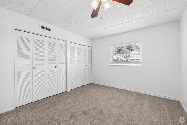 2BR, 1BA - 1,050SF - Primary Bedroom - Villas at City Center