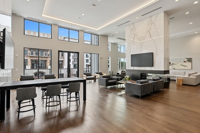 Spacious resident lounge with white marble countertops