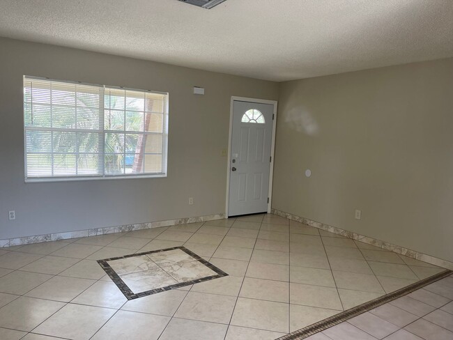 Photo - Adorable three bedroom two bath one car ga...