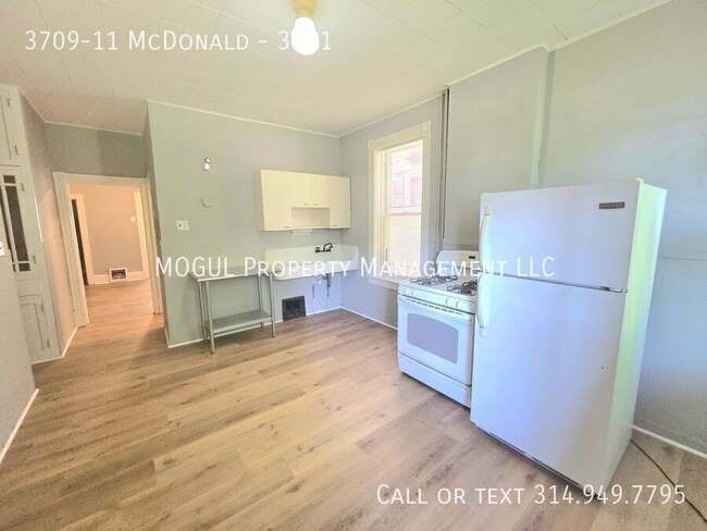 Building Photo - 3709-11 McDonald-3711 Unit 3711