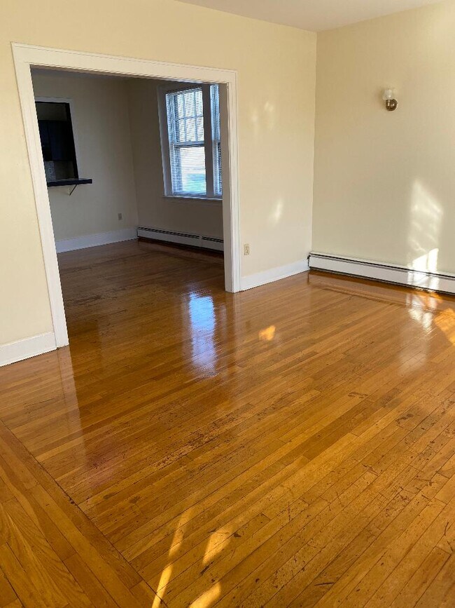 living room to dining - 558 Orange St Unit 202