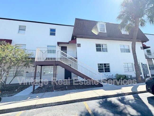 Building Photo - 9005 Tudor Dr Unit #H105