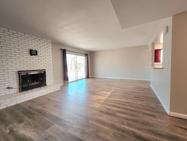 Photo - 4 Bedroom Two-Story Home with Downstairs Primary Bedroom & Fireplace