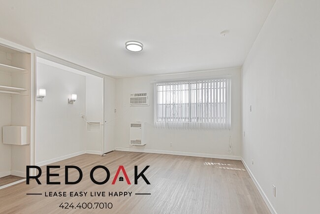 Building Photo - 509 S Manhattan Pl Unit 129