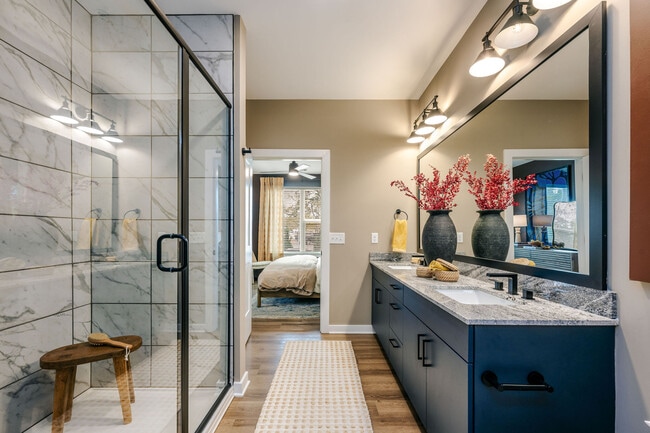 Luxe bathrooms with sleek granite counters