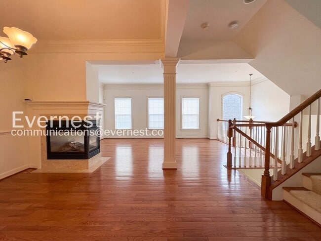 Photo - Spacious Living with Fireplace, Deck & Garage / 3 Bed & 4 Bath / Available Now!