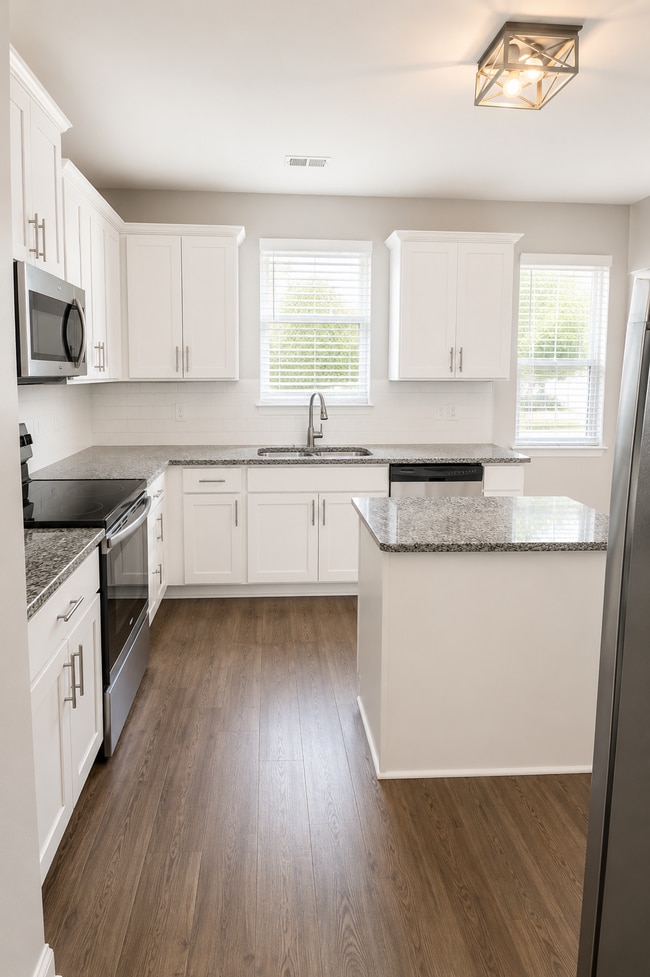 Photo - Spacious Elegance Awaits: 4-Bedroom Gem with Granite Countertops on Harrington Road!