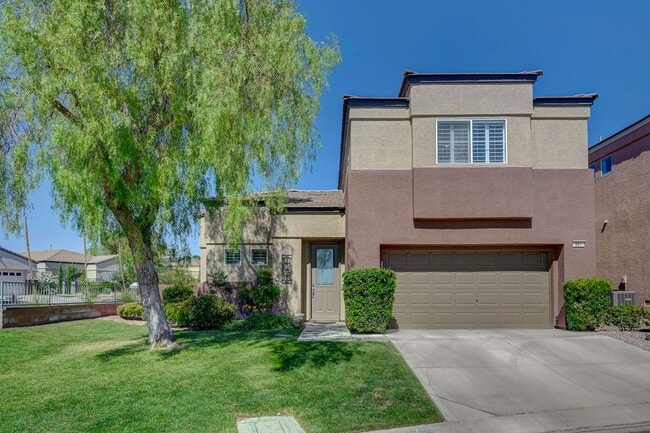 Building Photo - Situated on a beautifully landscaped oversized corner lot within the gated community of Desert Bl...