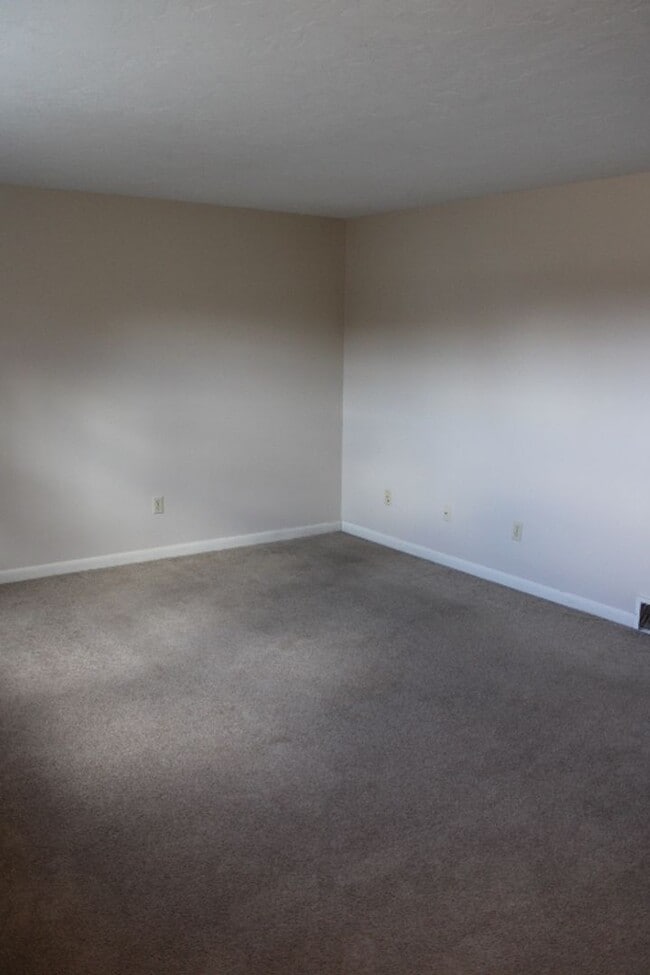 Photo - Move-In Ready 2BR Townhouse w/ Central AC & Off-Street Parking