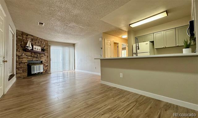 Photo - 4460 S Pitkin St Unidad 128