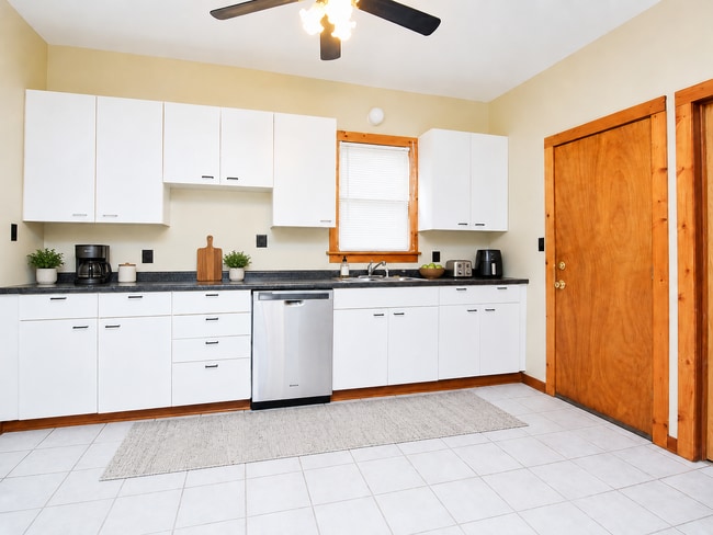 Photo - Spacious 2BR + Sunroom Main Floor in NE Arts District – Steps to Logan Park & Breweries Unit 1