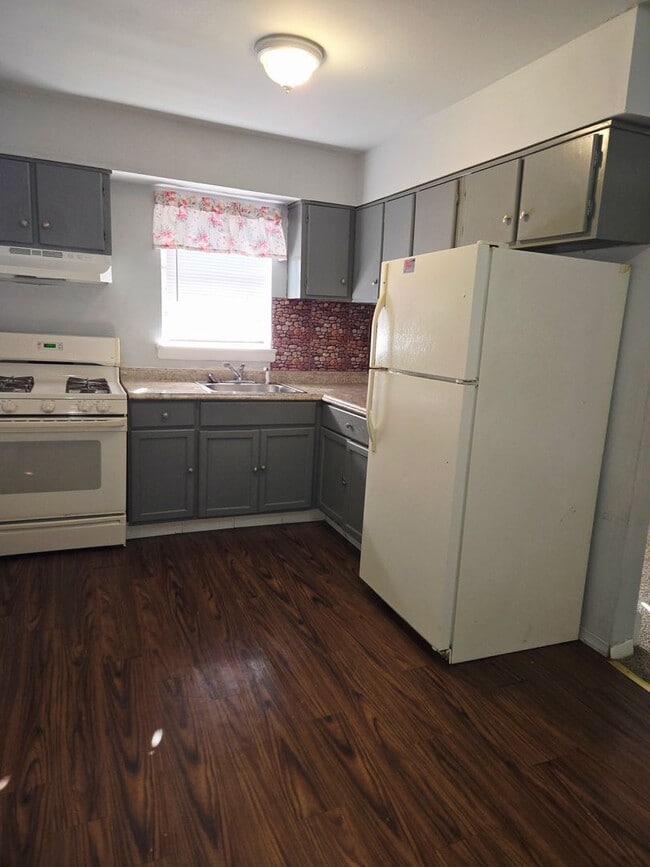 Building Photo - AMH - Carriage House Unit 12-1