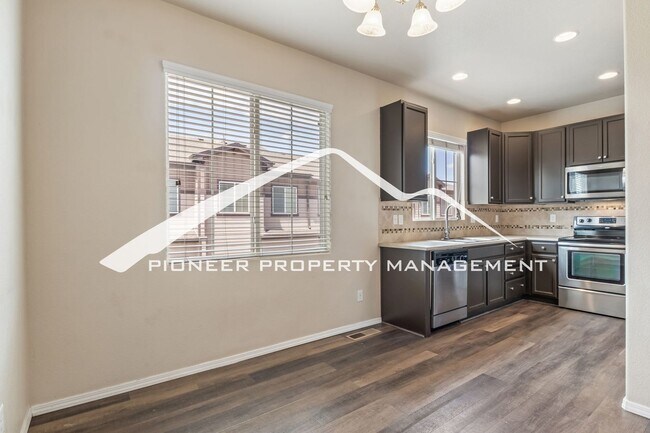 Photo - Low-Maintenance Living with Mountain Views! 3BR Townhome, 2-Car Garage & A/C