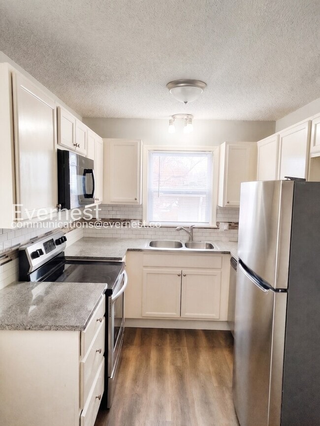 Photo - 4 Bed, 2 Bath Home with Garage / Pet-Friendly / Coming Soon!