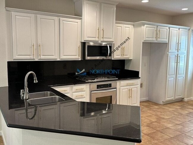 Photo - 4BR/3BA w/ Solar + Downstairs Bed/Bath in Whitney Oaks