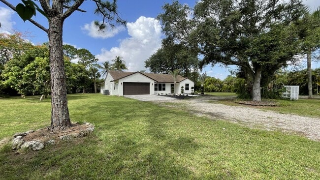 Photo - Spacious 3-Bedroom Oasis in Loxahatchee with 2 Full Baths